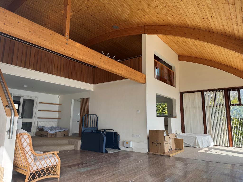 Lot: 106 - UNIQUE PROPERTY WITH STUNNING SEA VIEWS OVER THE ENGLISH CHANNEL - Looking Back into the Living Space